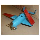 Vintage airplane with folding wings, RCA/Victor radio, jewelry, trick magnetic dogs, hair pin, Shoe horns