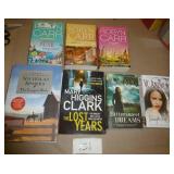 6 paperbacks and 1 hardback book for the price of one