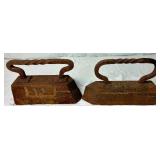 Pair of Antique Cast Iron Sad Irons - 22lb and 28lb with Twisted Handles