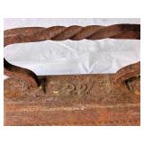 Pair of Antique Cast Iron Sad Irons - 22lb and 28lb with Twisted Handles