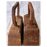 Pair of Antique Cast Iron Sad Irons - 22lb and 28lb with Twisted Handles