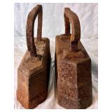 Pair of Antique Cast Iron Sad Irons - 22lb and 28lb with Twisted Handles