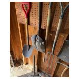 Collection of Garden and Hand Tools Including Shovels and Axe