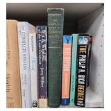 Collection of Hardcover and Paperback Books on Various Topics