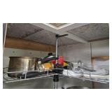 Assorted Kitchenware Including Pots, Pans, and Glass Dish