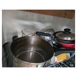 Assorted Kitchenware Including Pots, Pans, and Glass Dish