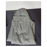 Assortment of Clothing and Gear Including Pants, Backpack, and Towels