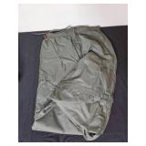 Assortment of Clothing and Gear Including Pants, Backpack, and Towels