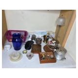 Mixed Household Items Including Decor, Tools, and Batteries