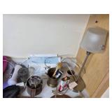 Mixed Household Items Including Decor, Tools, and Batteries