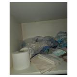 Assorted Collection of Bathroom Towels, Toiletries, and First Aid Supplies
