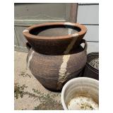 Collection of Rustic Outdoor Pots and Planters