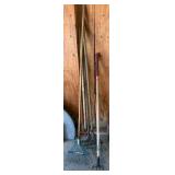 Assortment of Garden Rakes and Tools