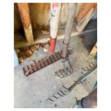Assortment of Garden Rakes and Tools
