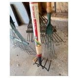 Assortment of Garden Rakes and Tools