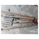 Group of Gardening Tools Including Shovels, Rake, and Fork