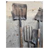 Group of Gardening Tools Including Shovels, Rake, and Fork