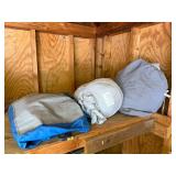 Collection of Car Covers in Storage Bags