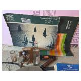 Assorted Desk Supplies and Nautical Charts Collection