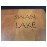 CUSTOM WOOD CARVING OF SWAN LAKE