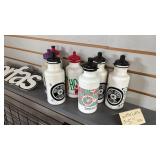 Assorted Water Bottles and Handlebar Mounted Bottle Cages