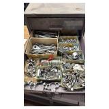 Assorted Schwinn Twin Stick Shifter Parts in Storage Cabinet