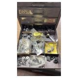 Assorted Schwinn Twin Stick Shifter Parts in Storage Cabinet