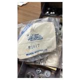 Assorted Schwinn Twin Stick Shifter Parts in Storage Cabinet