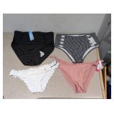 (4) NEW WOMENS ASSORTED SWIMWEAR BOTTOMS (LARGE)