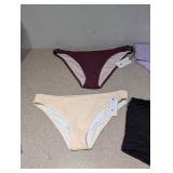 (4) NEW WOMENS ASSORTED SWIMWEAR BOTTOMS (LARGE)