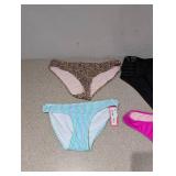 (4) NEW ASSORTED WOMEN’S SWIMWEAR BOTTOMS (SMALL)
