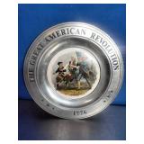 This is a vintage commemorative pewter plate titled "The Great American Revolution 1776," featuring a ceramic insert depicting the iconic "Spirit of 