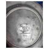 This is a vintage commemorative pewter plate titled "The Great American Revolution 1776," featuring a ceramic insert depicting the iconic "Spirit of 