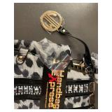 Fashionable Leopard Print Handbag with Gold Accents