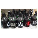 13 Half-gallon beer growlers from breweries around Minnesota