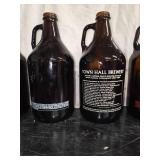 13 Half-gallon beer growlers from breweries around Minnesota