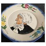 2 decorative Charolles plates featuring an old couple