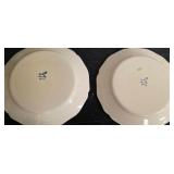 2 decorative Charolles plates featuring an old couple