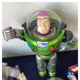 Group of 4 Assorted Buzz Lightyear Action Figures
