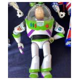Group of 4 Assorted Buzz Lightyear Action Figures