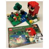 Collection of LEGO Minecraft Sets with Characters and Manuals