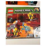 Collection of LEGO Minecraft Sets with Characters and Manuals