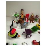 Collection of Assorted Action Figures and Toy Cars