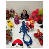 Collection of Assorted Action Figures and Toy Cars