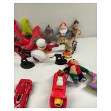 Collection of Assorted Action Figures and Toy Cars