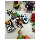 Collection of Assorted Action Figures and Toy Cars