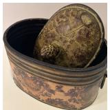 Vintage Metal Tin with Ornate Lid and Decorative Floral Design