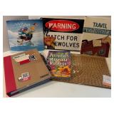 Collection of Notebooks and Decorative Signs