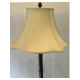 Ornate Brass and Fabric Floor Lamp with Detailed Base and Shade