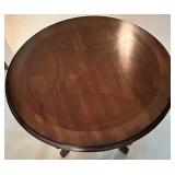 Round Wooden Table with Ornate Detailing